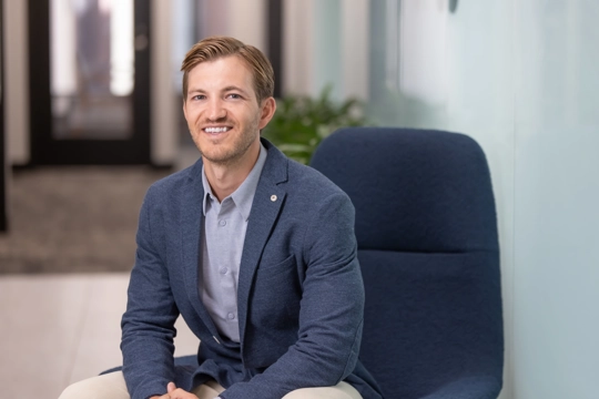 portrait of a smiling person in professional attire